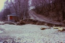 Erosion at base of old beach road